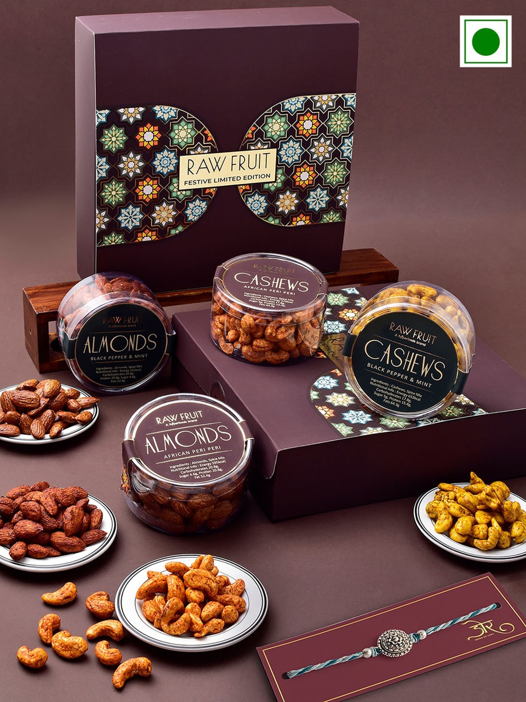 

RawFruit Round Charm Rakhi With Roli & Chawal & Roasted Dryfruits Gift Set, Silver