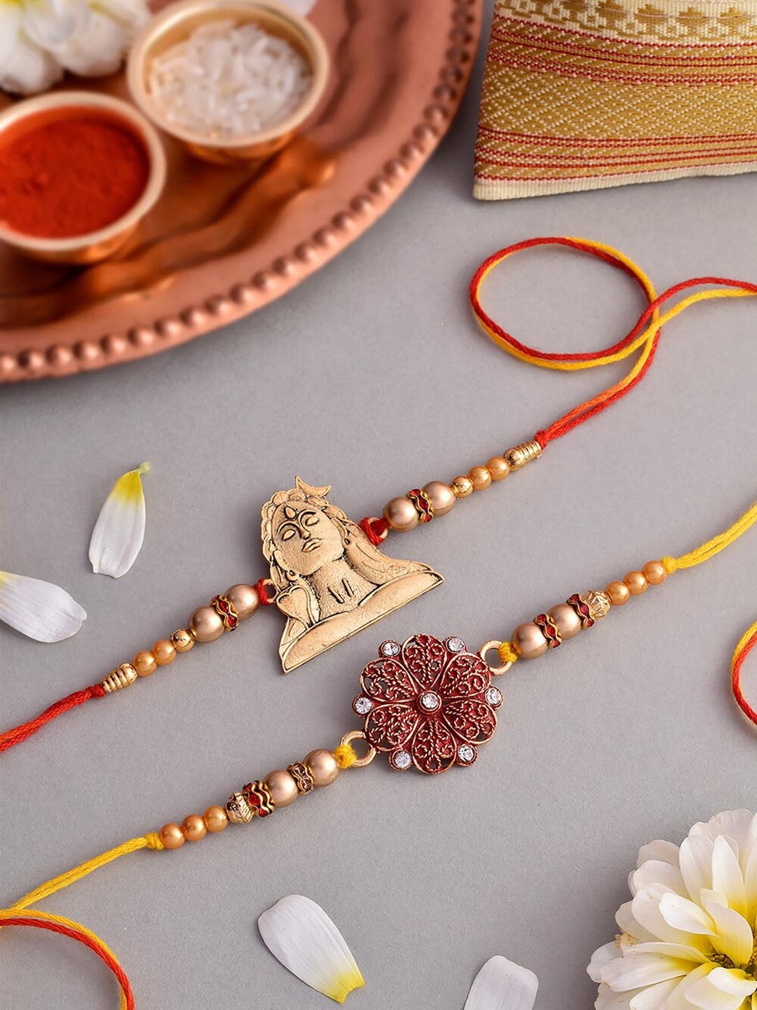 

RawFruit Set Of 2 shiva & Floral charm Rakhi With Dryfruits Gift Set, Gold