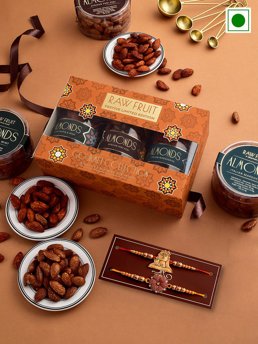 

RawFruit Set Of 5 Shiva & Floral charm Rakhi With Roasted Almonds Gift Set 220 gms Each, Gold