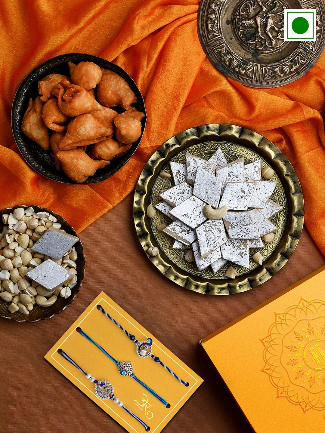 

RawFruit Set Of 3 Peacock charm Rakhis With Roli Chawal & Sweet Savoury Gift Set, Silver