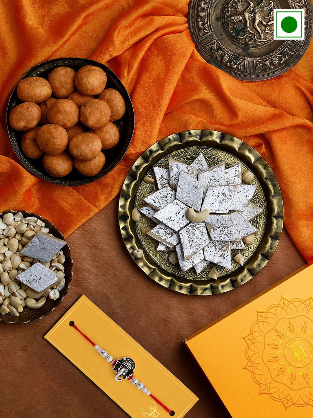 

RawFruit Ganesh Charm Rakhi With Roli Chawal & Sweet Savoury Gifts Set, Silver