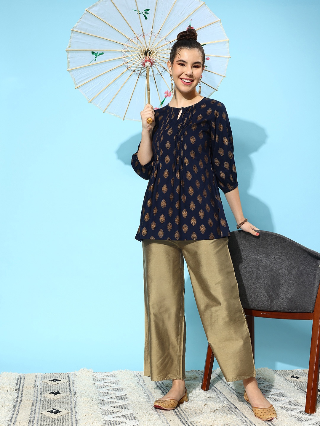 

Libas Women Relaxed Solid Regular Fit Pleated Trousers, Gold