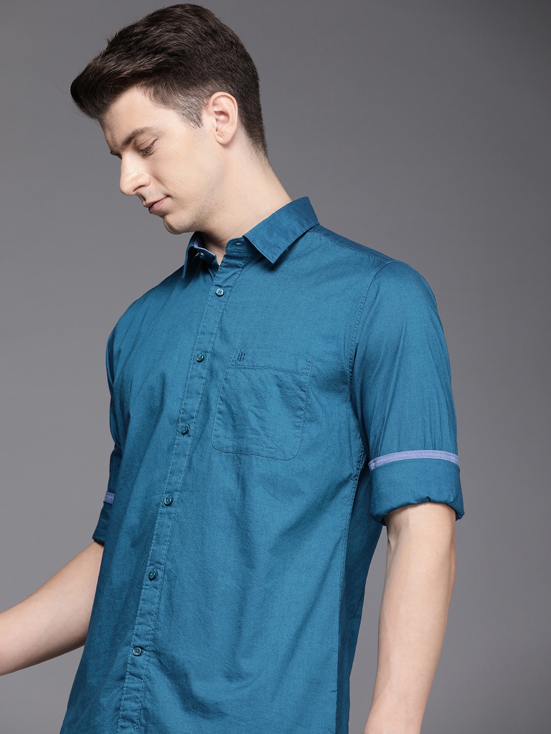 

Raymond Solid Slim Fit Pure Cotton Casual Shirt, Teal