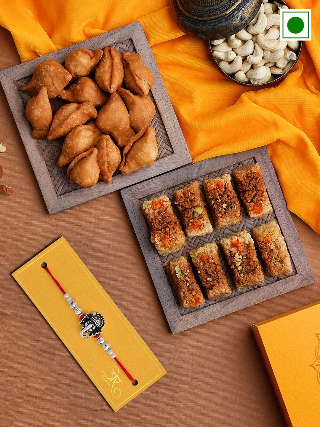 

RawFruit Ganesh Charm Rakhi With Roli Chawal & Sweet Savoury Gifts Set, Silver