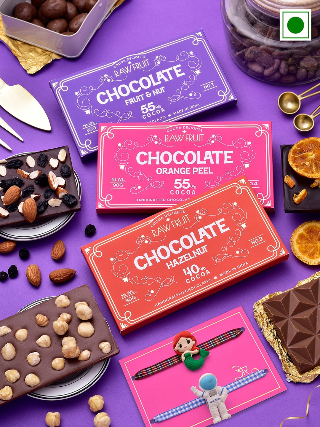 

RawFruit Set Of 2 Charm Rakhis With Coverture Chocolates Bar - 90g Each, Purple