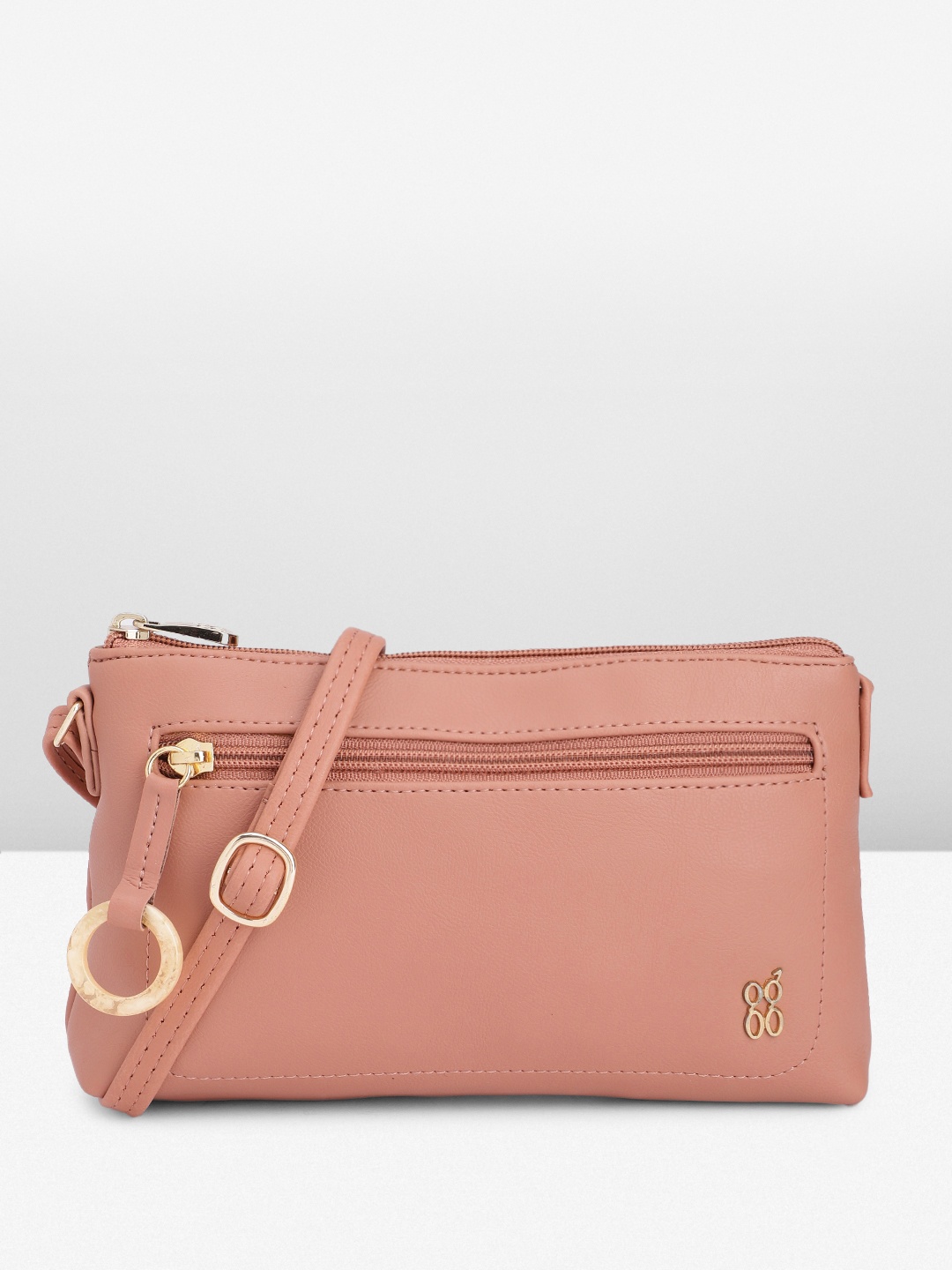 

Baggit Solid PU Structured Sling Bag with Tasselled Detail, Peach