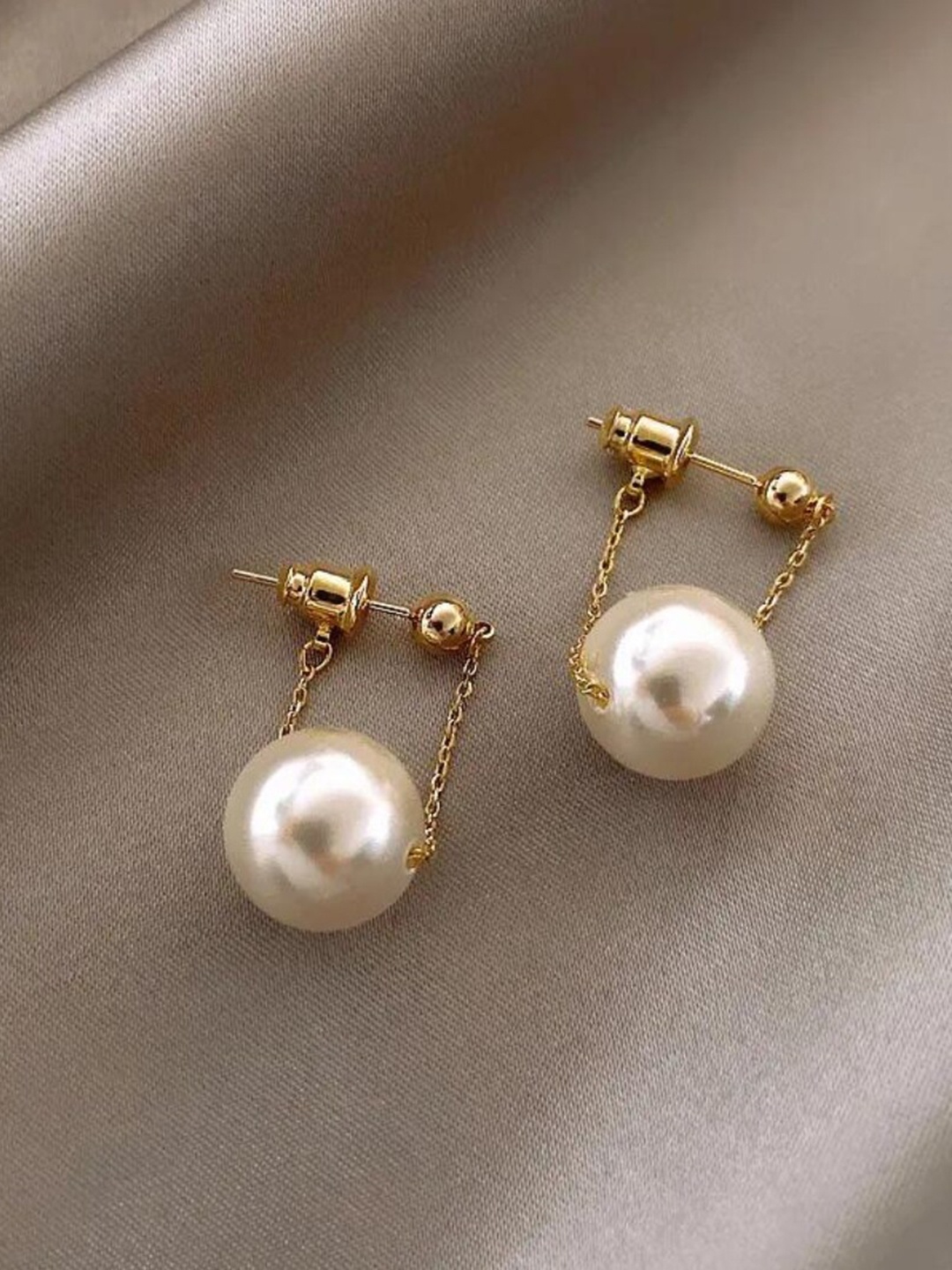 

CHOKORE Gold-Plated Pearl Beaded Contemporary Drop Earrings