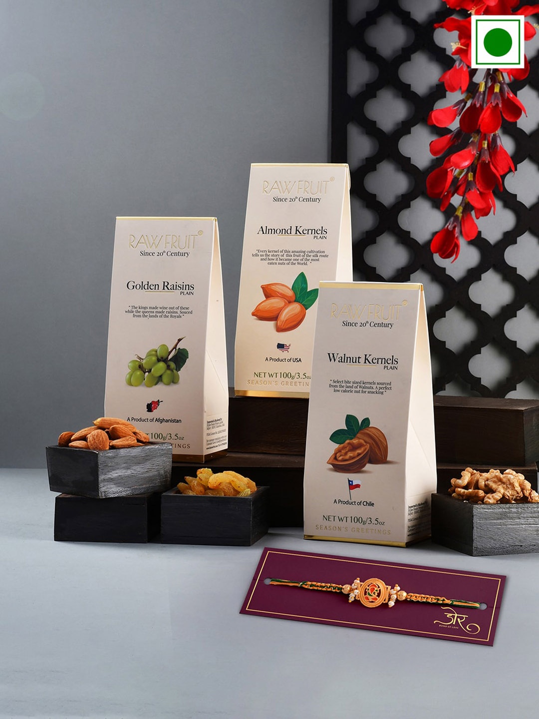 

RawFruit Ganesha Charm Rakhi with Dry Fruits Gift Set 100 gms Each, Gold