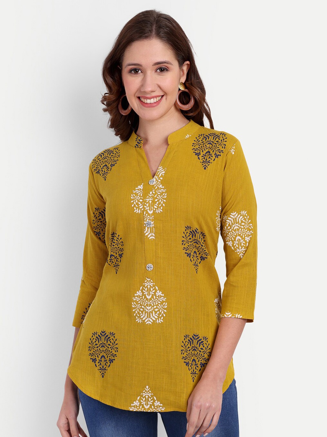 

HANUMNTRA Ethnic Motifs Printed Mandarin Collar Longline Top, Mustard