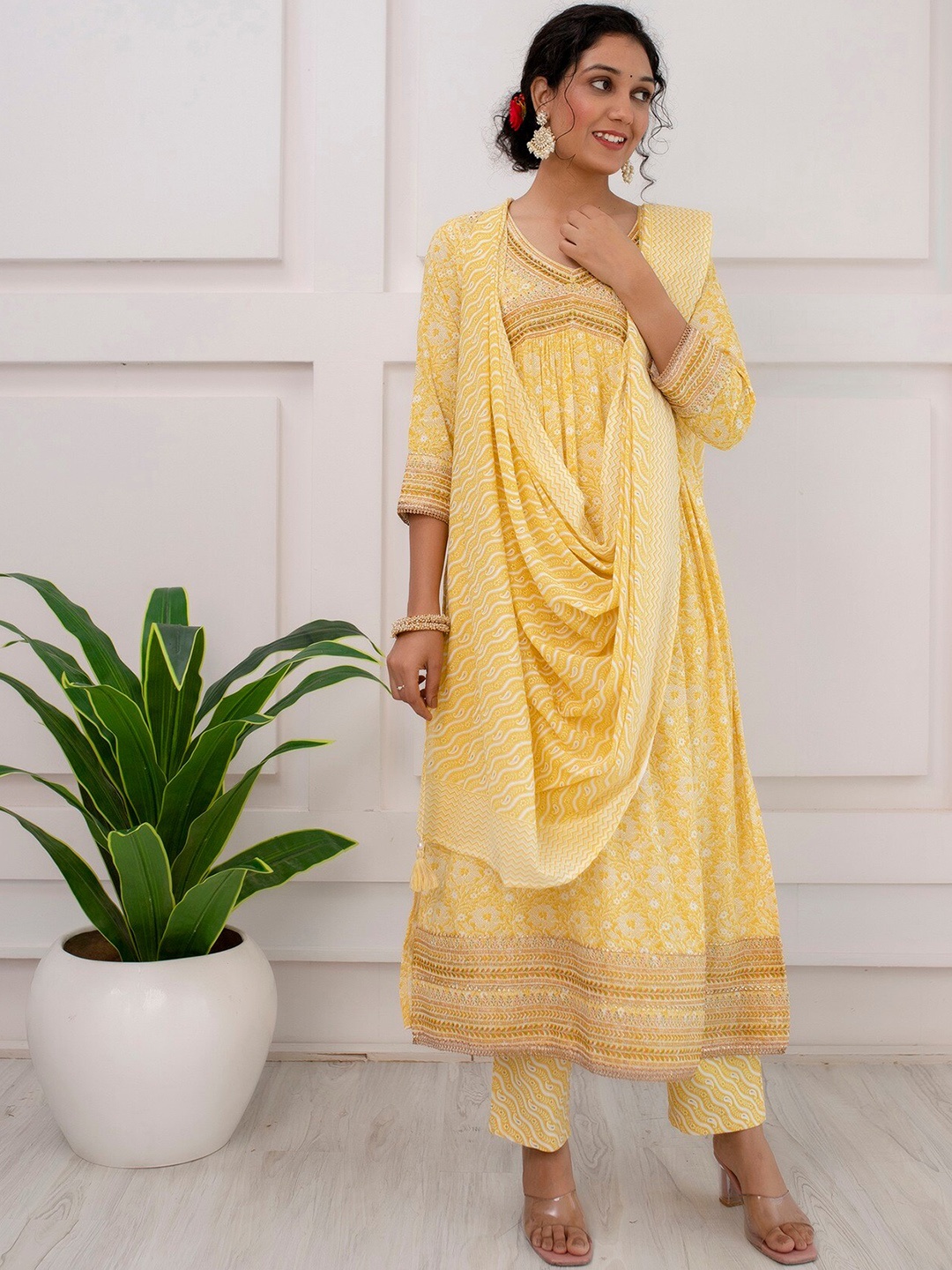 

KALINI Floral Printed Pleated Beads and Stones A-Line Kurta with Trousers & Dupatta, Yellow