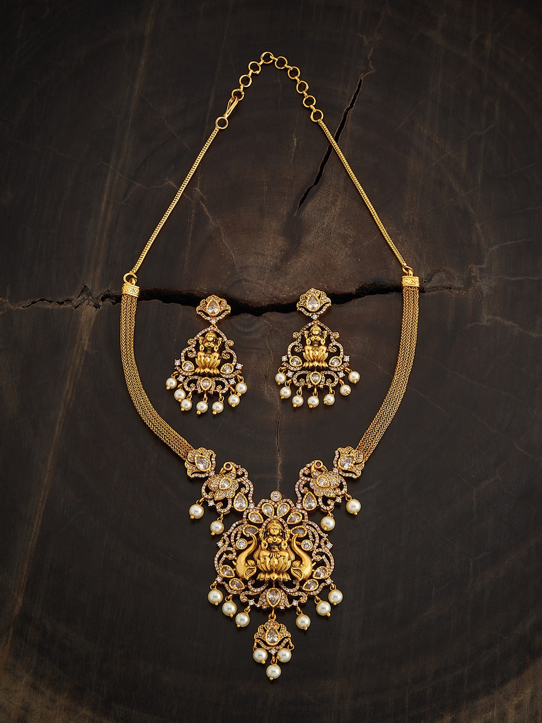 

Kushal's Fashion Jewellery Gold-Plated Stone-Studded & Pearl Beaded Jewellery Set