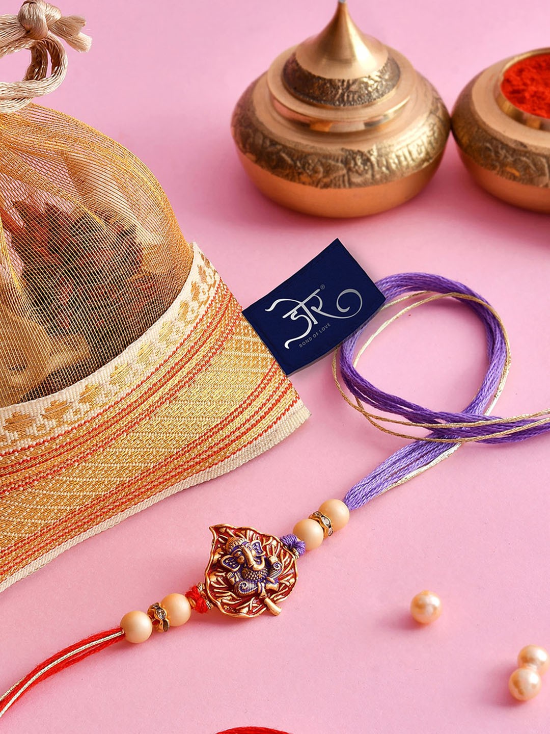 

Hyperfoods Ganesha Rakhis With Sapphire Choco Cookies Gift Set 375g, Purple