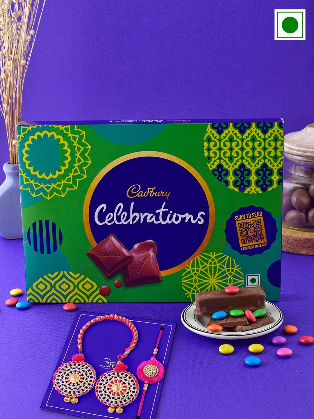 

Hyperfoods Bhai Bhabhi Rakhi With Cadbury Celebrations Chocolate 113 gms, Pink