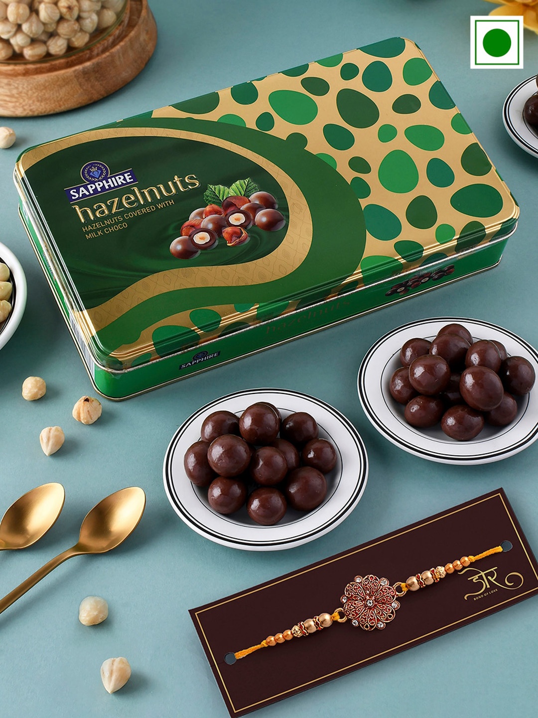 

Hyperfoods Stone-Studded Rakhi With Sapphire HazelNut Chocolate Gift Set, Red
