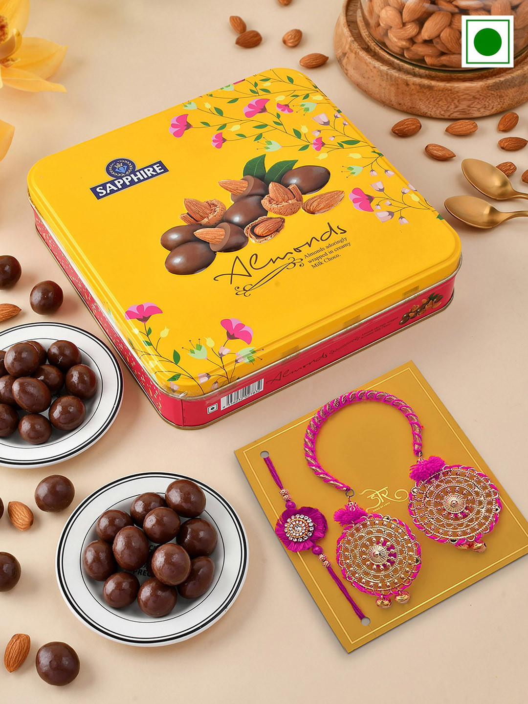 

Hyperfoods Set Of 2 Stone-Studded Rakhis With Sapphire Chocolate Coated Almond Set, Yellow