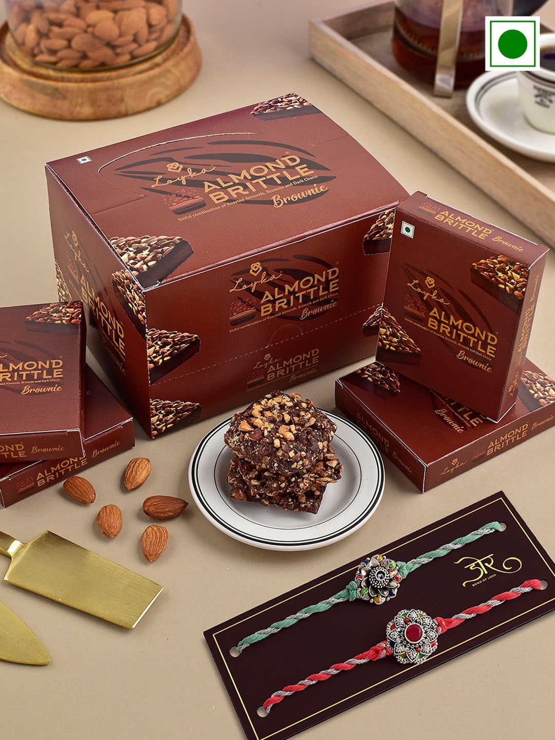 

Hyperfoods Set Of 2 Rakhis With Loyka Almond Brownie-15gms Each, Red