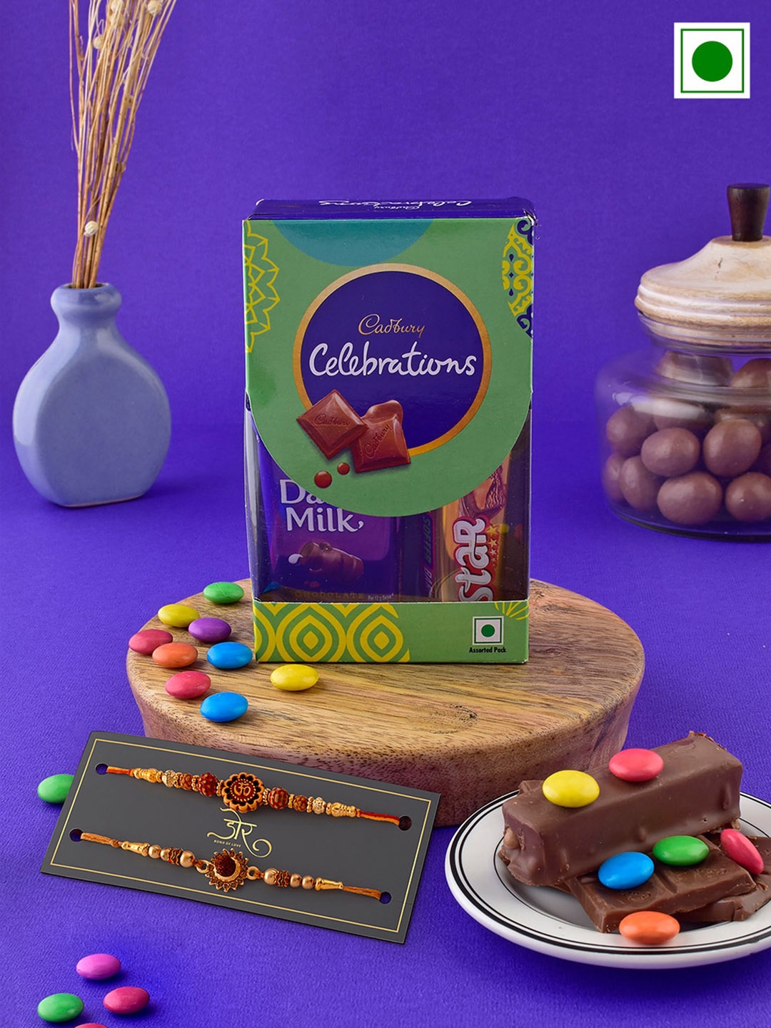 

Hyperfoods Set Of 2 Om & Rudraksh Charm Rakhis With Chocolate Gifts Set, Yellow