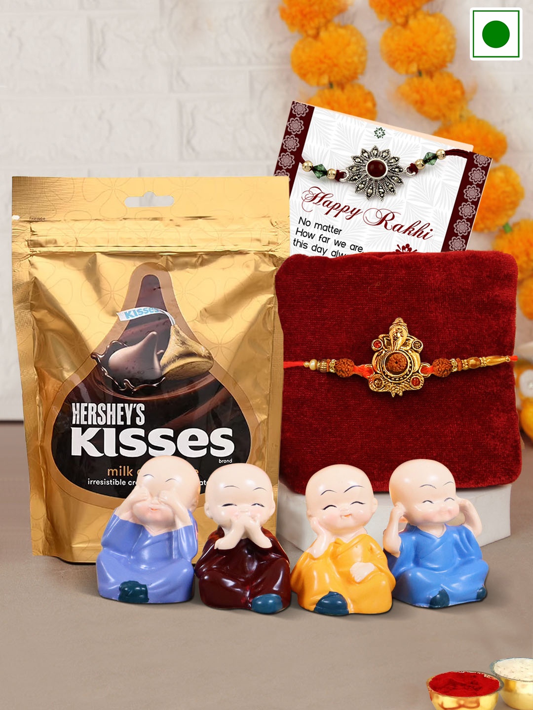 

TIED RIBBONS Ganesh Rakhi With 4 Idol & Hersheys Kisses Chocolate Pack-36g, Red