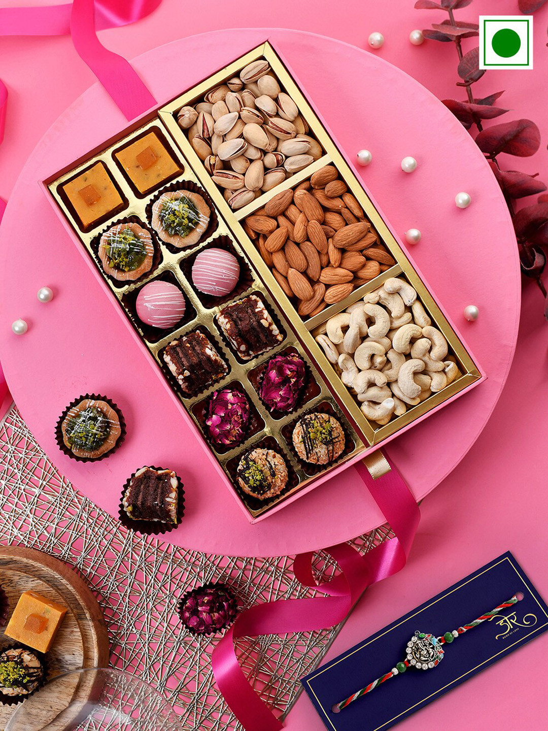 

RawFruit Ganesha Charm Rakhi with Sweets & Dry Fruit Gift Set, Red