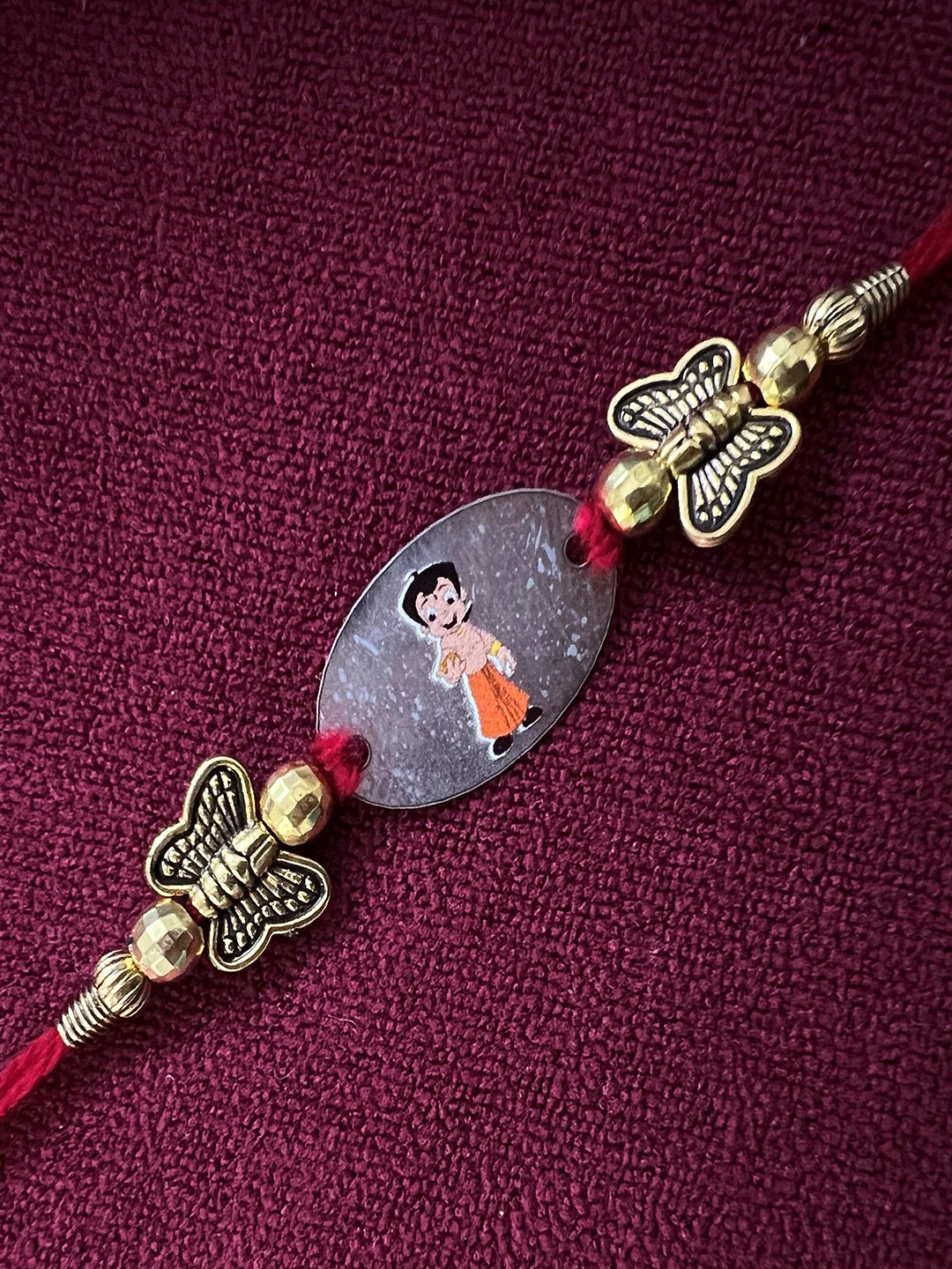 

Arte Jewels Kids Chota Bheem Printed Rakhi, Silver