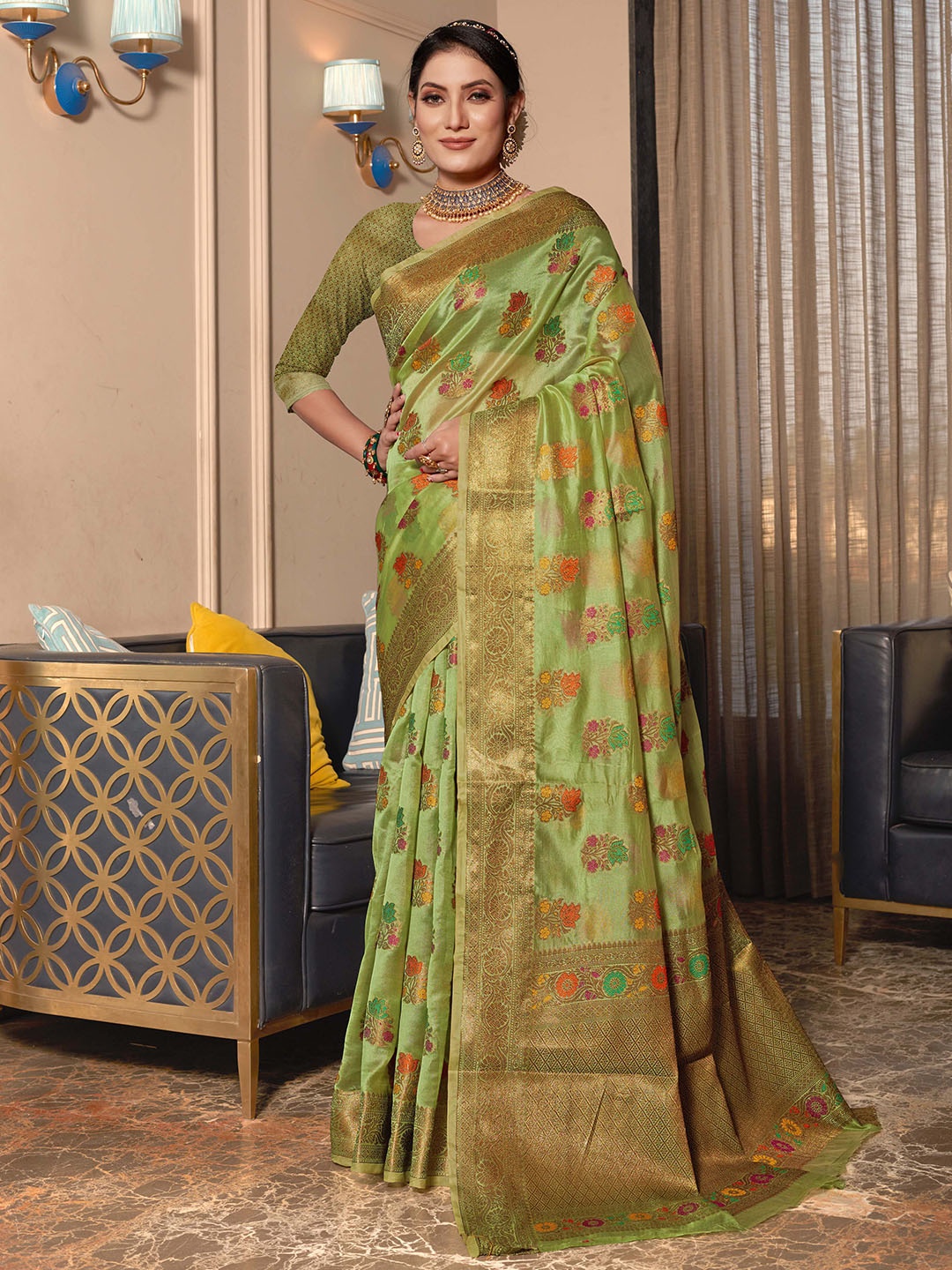 

Mitera Green Floral Woven Design Zari Organza Saree