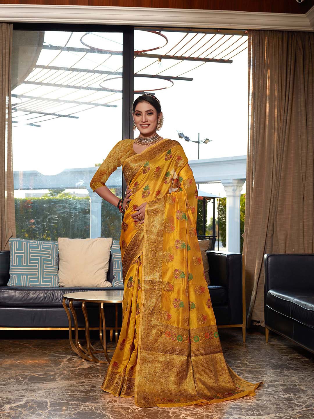 

Mitera Mustard Floral Woven Design Zari Organza Saree
