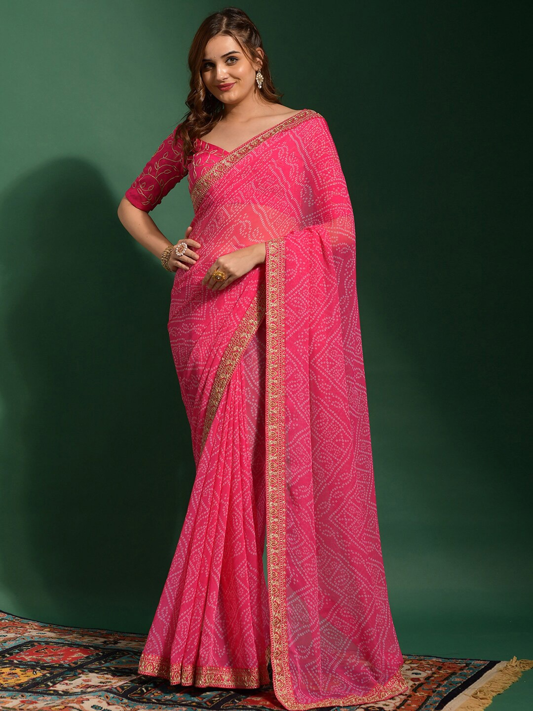 

Anouk Pink & White Bandhani Printed Zari Pure Georgette Bandhani Saree