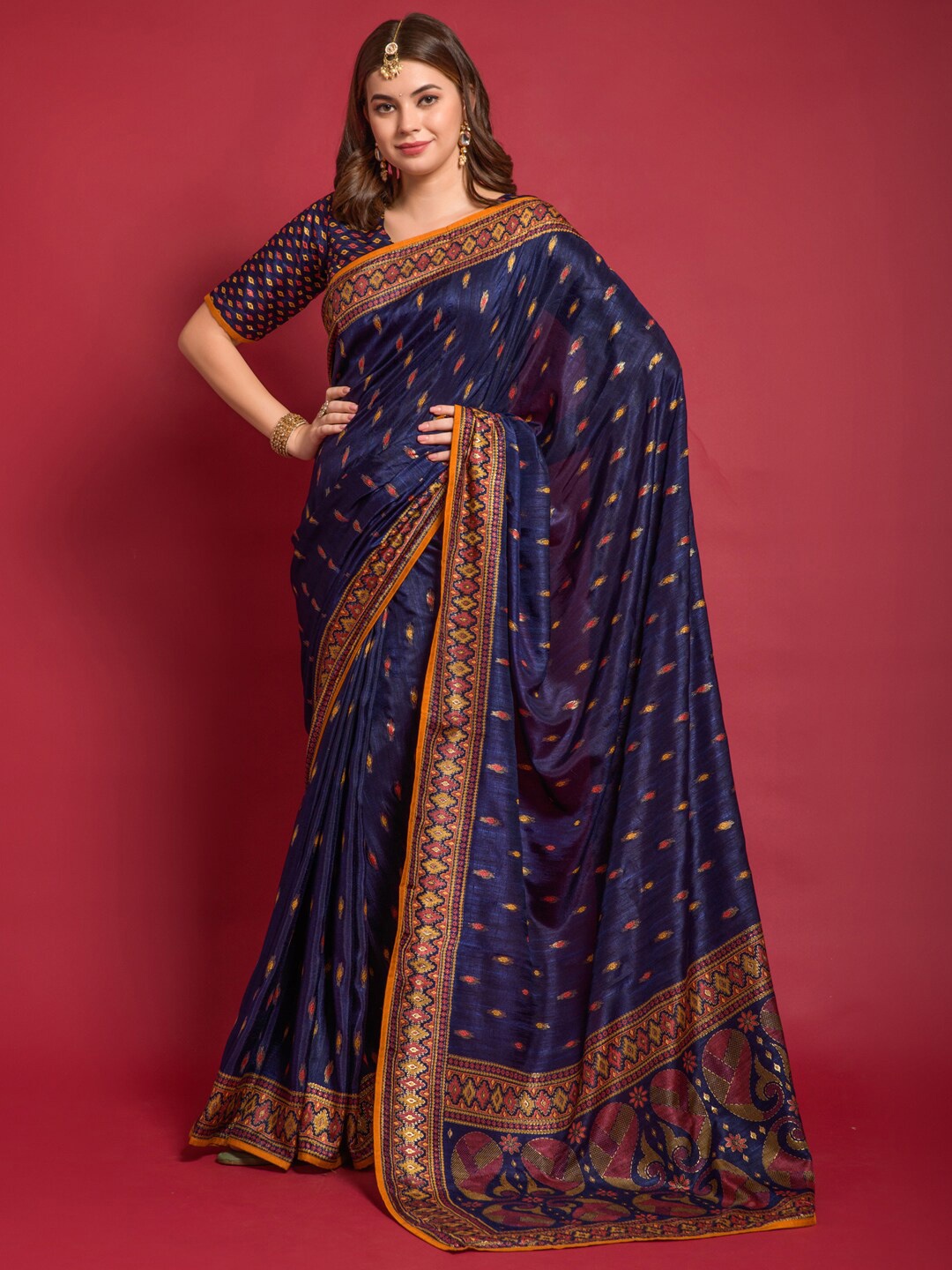 

Anouk Navy Blue & Red Ethnic Motifs Printed Ikat Saree