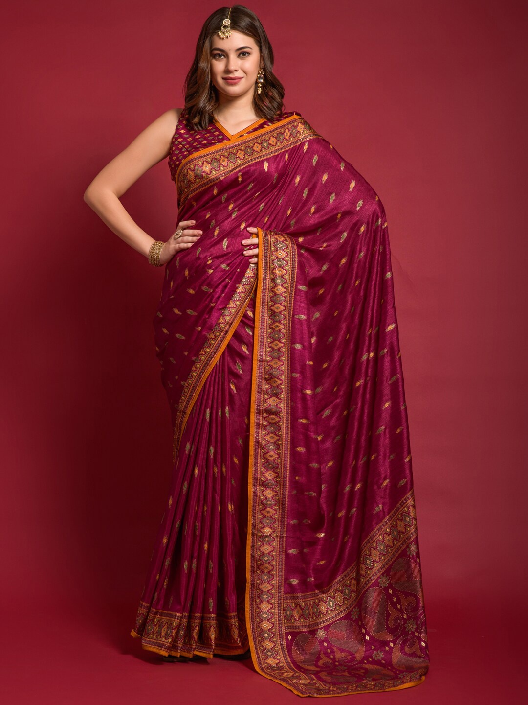 

Anouk Magenta Ethnic Motifs Printed Zari Silk Blend Ikat Saree