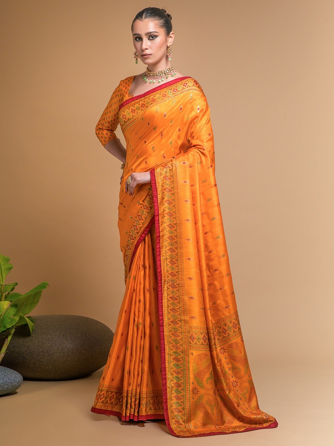 

Anouk Mustard & Green Ethnic Motifs Printed Zari Ikat Saree