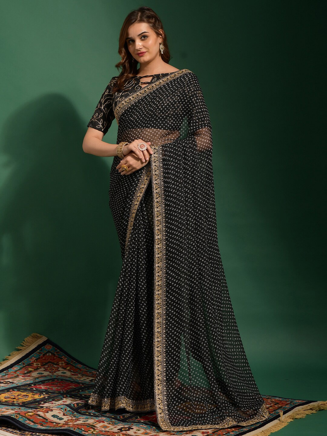 

Anouk Black & White Printed Sequinned Pure Georgette Bandhani Saree