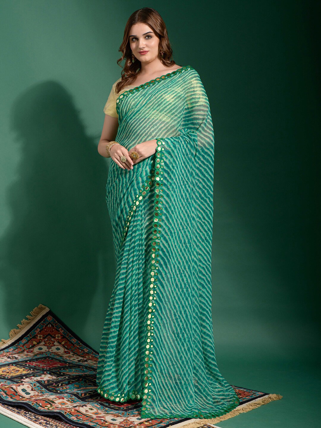 

Anouk Teal & White Leheriya Mirror Work Pure Chiffon Saree