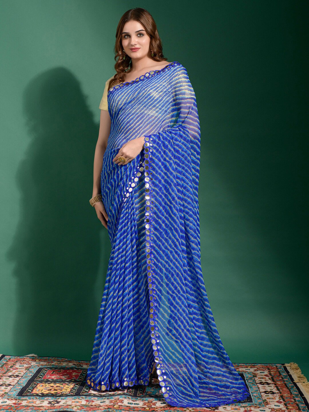 

Anouk Blue & White Leheriya Striped Mirror Work Pure Chiffon Saree