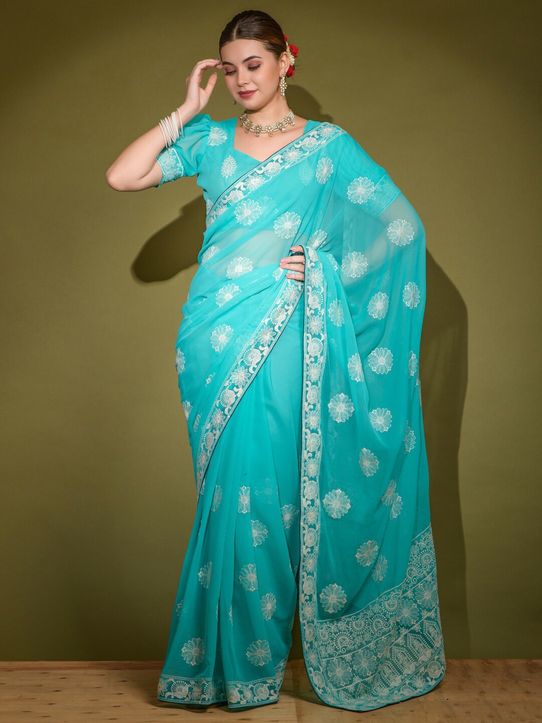 

Anouk Blue & White Floral Embroidered Pure Georgette Saree