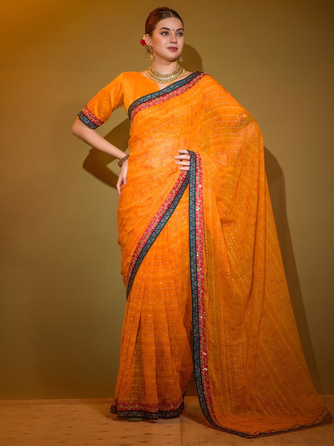 

Anouk Yellow & White Ethnic Motifs Beads and Stones Pure Georgette Saree