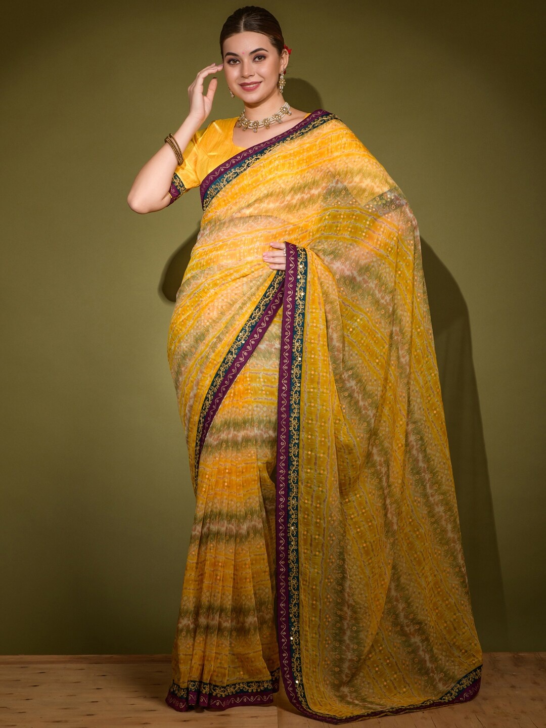

Anouk Yellow & Black Ethnic Motifs Printed Sequined Pure Georgette Bagru Saree
