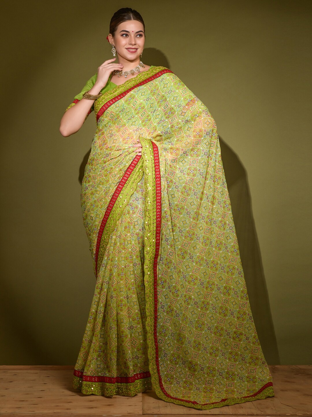 

Anouk Green & Red Ethnic Motifs Printed Sequinned Saree