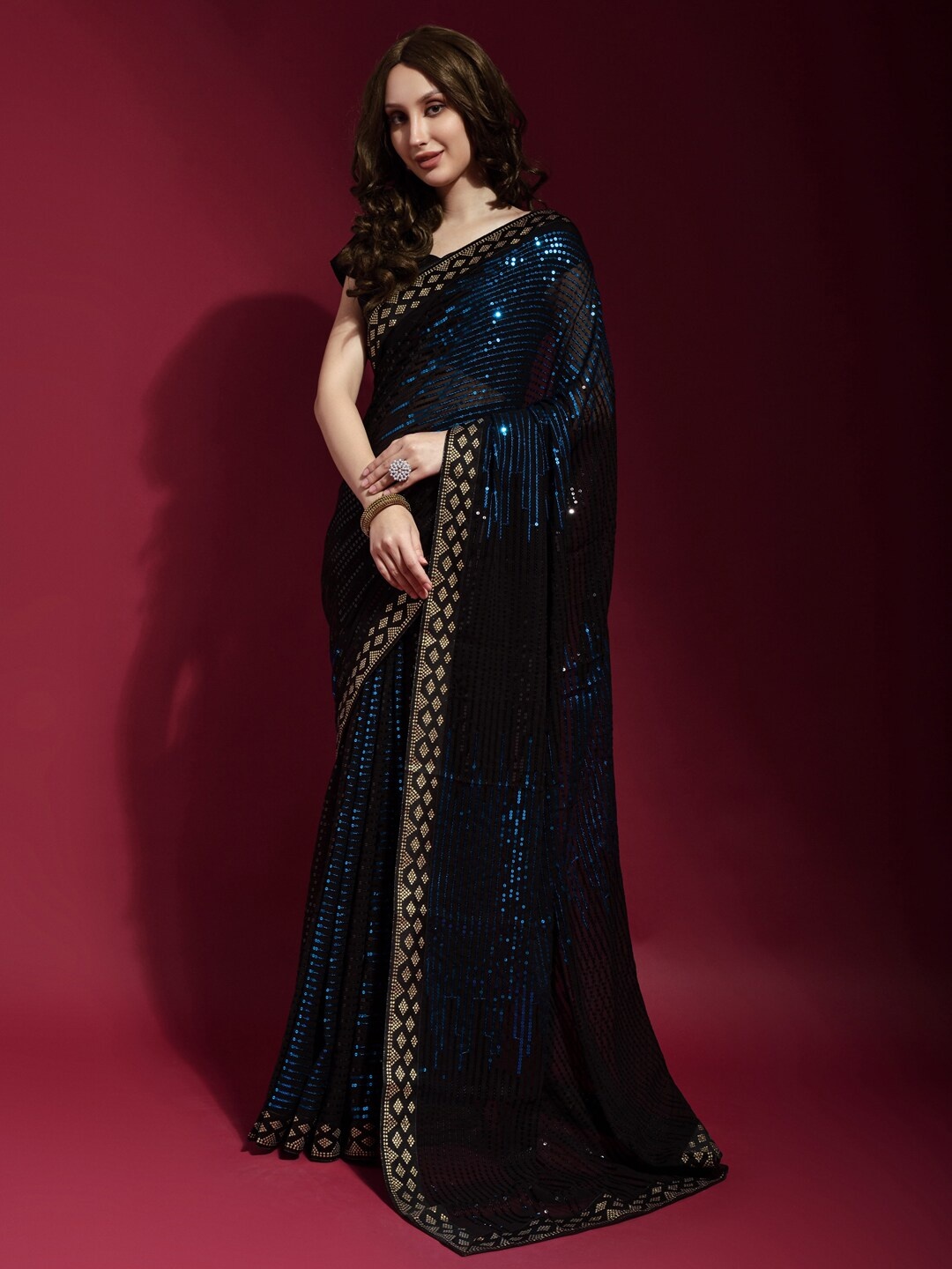 

Anouk Black & Blue Embellished Sequinned Pure Georgette Saree