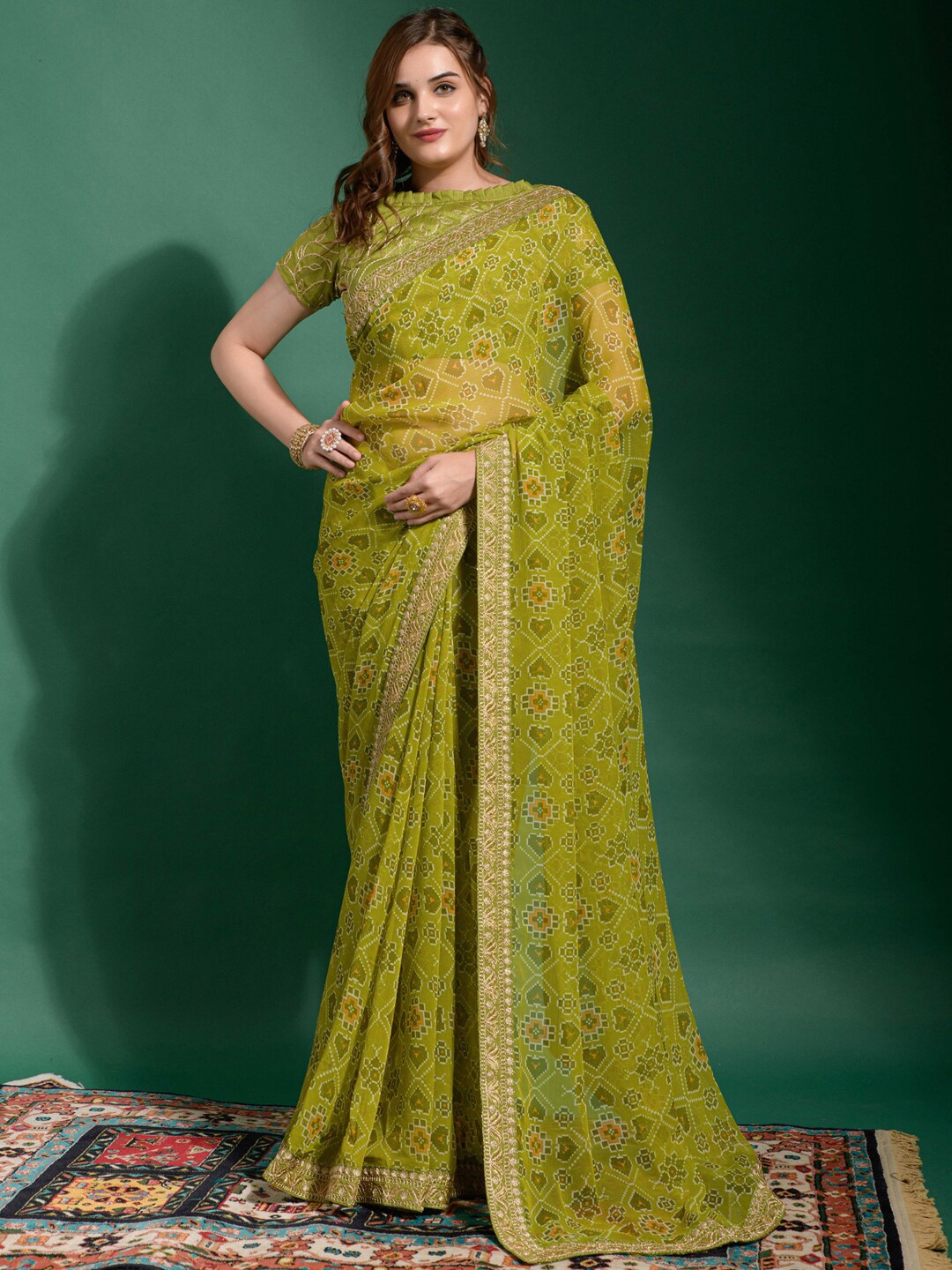 

Anouk Green & Orange Ethnic Motifs Printed Sequined Pure Georgette Ikat Saree