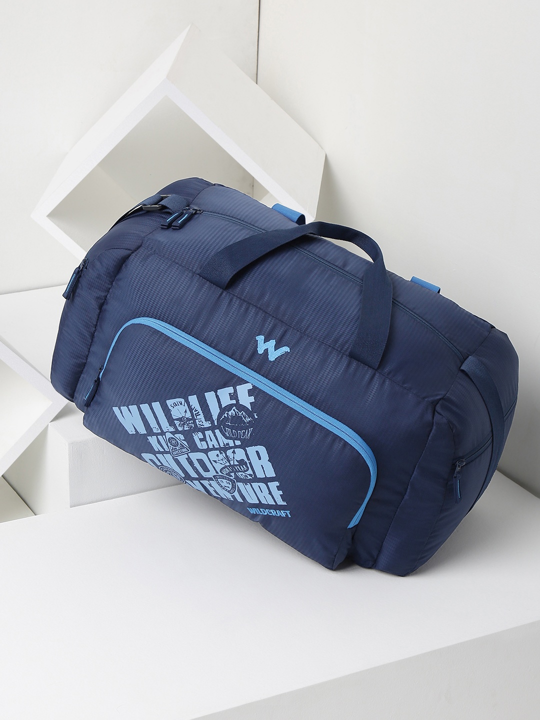 

Wildcraft Unisex Brand Logo Print & Textured Foldable Air Duff 2.0 Large Duffel Bag, Navy blue