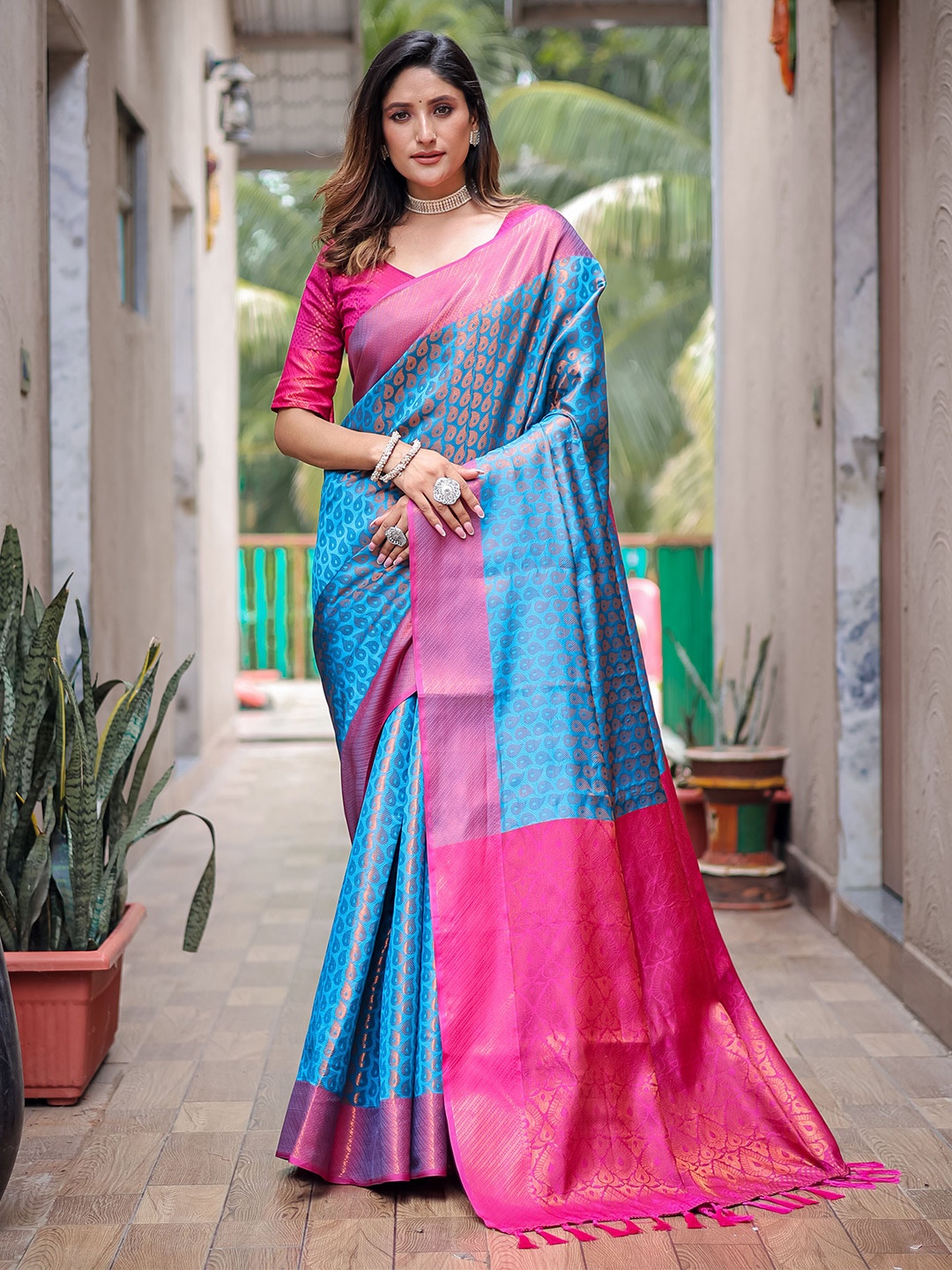 

Mitera Blue Ethnic Motifs Woven Design Zari Saree