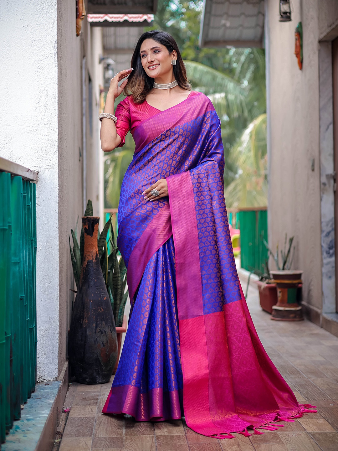 

Mitera Blue Ethnic Motifs Woven Design Zari Saree