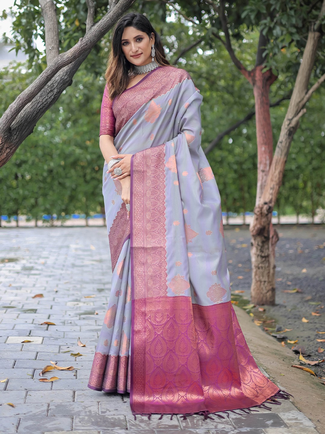 

Mitera Grey Ethnic Motifs Woven Design Zari Saree