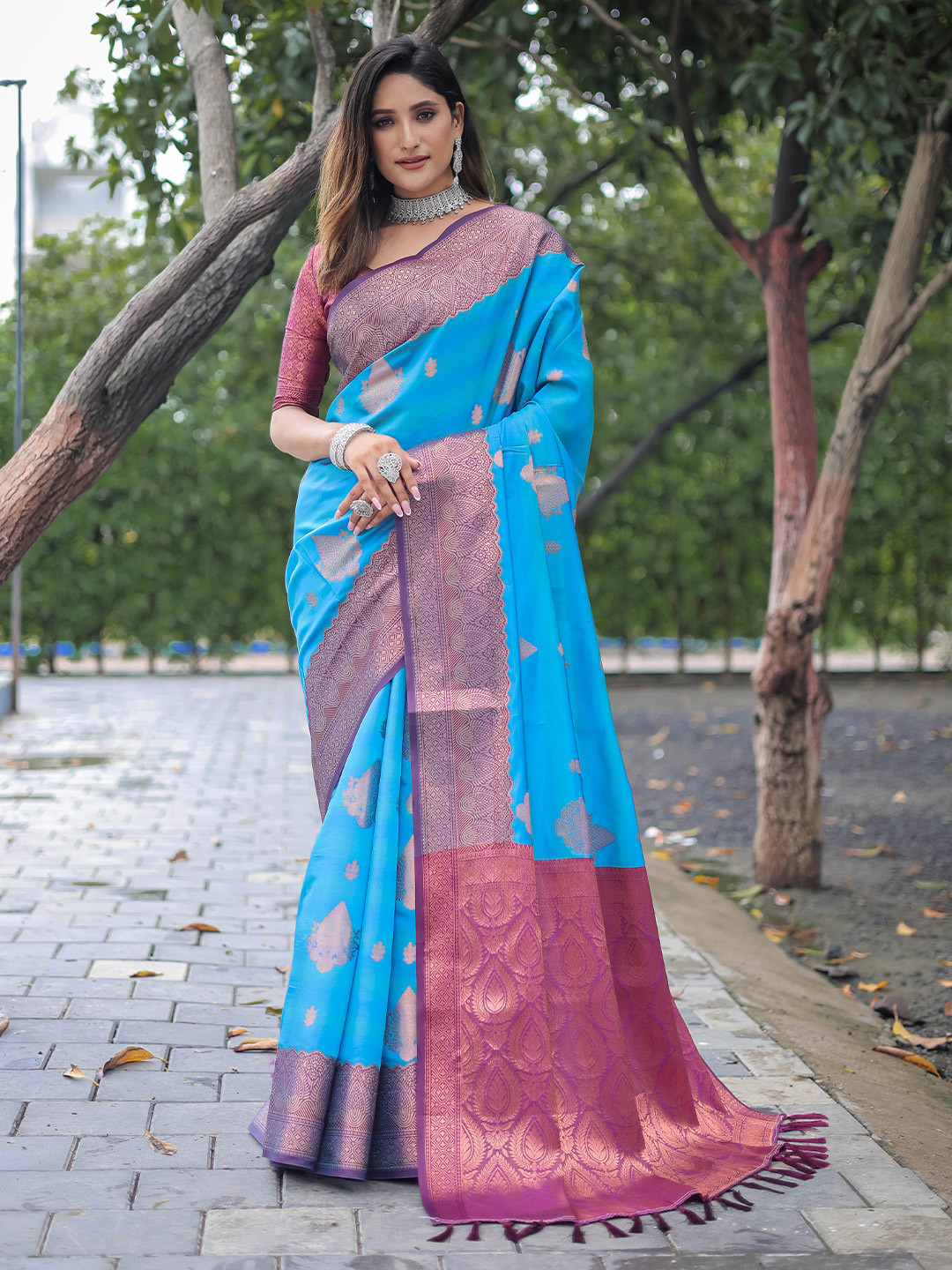 

Mitera Blue Ethnic Motifs Woven Design Zari Saree