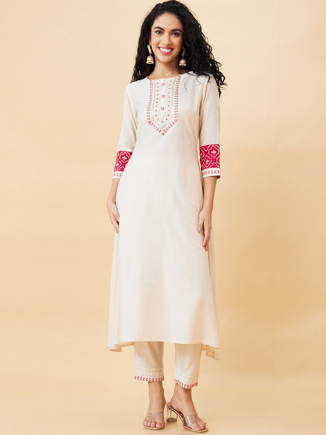 

Globus Off White Ethnic Motifs Yoke Design Thread Work Sequined A-Line Kurta with Trousers