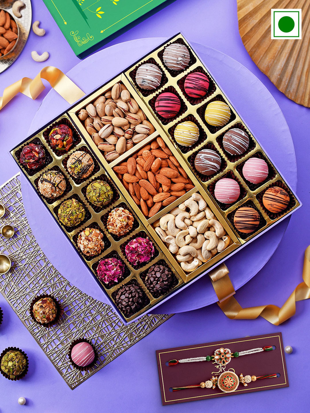 

RawFruit Set Of 2 Rakhi with Laddoo & Marzipan Balls with Roasted Dry Fruit Gift Set, Purple