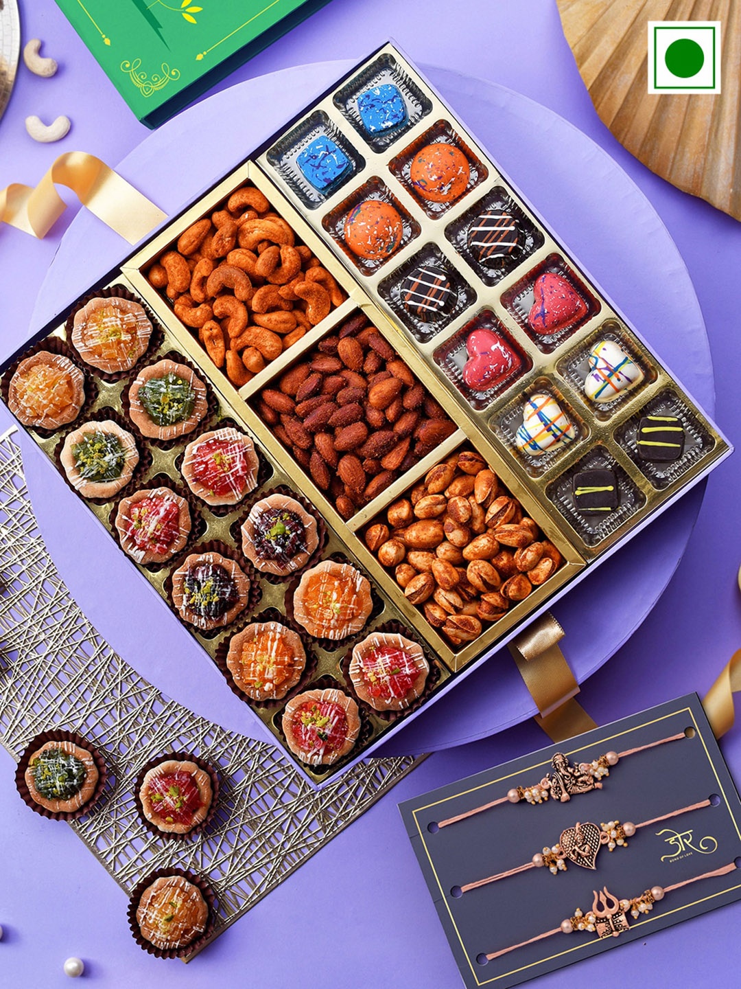 

RawFruit Set of 3 Rakhi with Tarts & Chocolate with Roasted Dry Fruit Gift Set, Rose gold