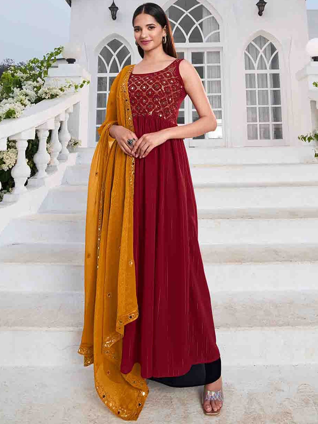 

Mitera Red Ethnic Motifs Embroidered Mirror Work A-Line Kurta & Palazzos With Dupatta