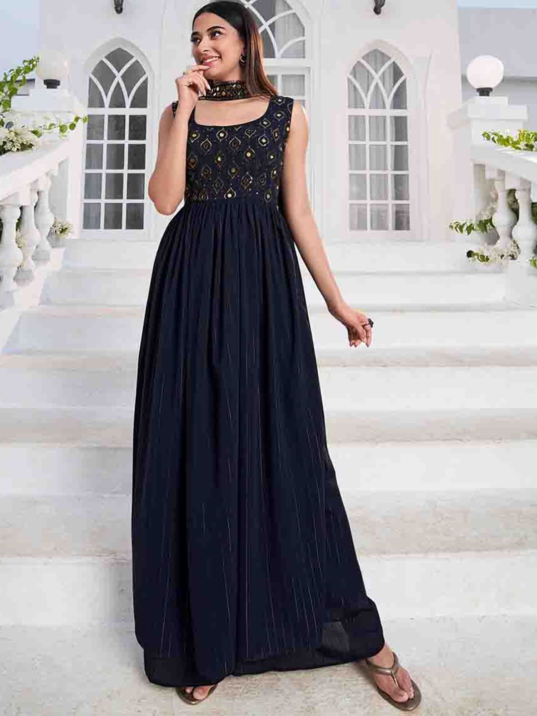 

Mitera Blue Ethnic Motifs Embroidered Mirror Work A-Line Kurta & Palazzos With Dupatta