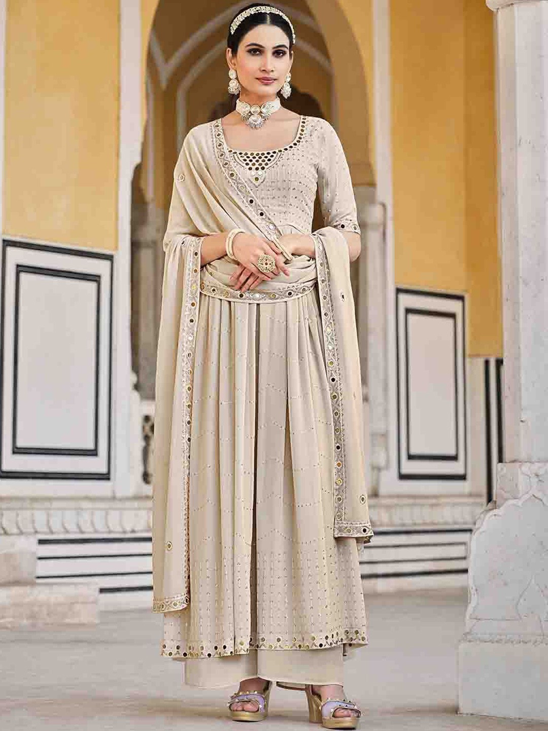 

Mitera Beige Ethnic Motifs Embroidered Mirror Work Anarkali Kurta & Palazzos With Dupatta